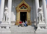Bangkok 02 04 Wat Benchamabophit Marble Wat Posing at Entrance
